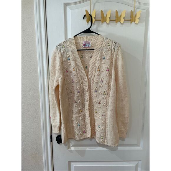 Smiths Bermuda Sweaters - Smith's Bermuda cardigan is a cream-colored knit featuring delicate floral embro
